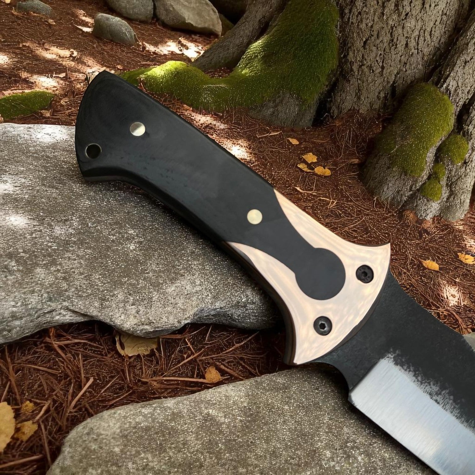 Close-up of right side of 11-inch hunting knife with chiton-pattern G10 handle