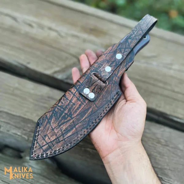 d2 hunting knife with teeth blade and micarta handle with leather sheath for outdoor use