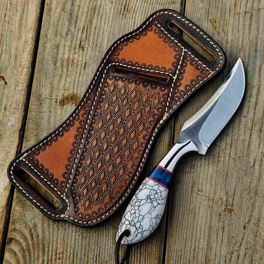Full view Western Style cowboy hunting knife with sheath outdoors