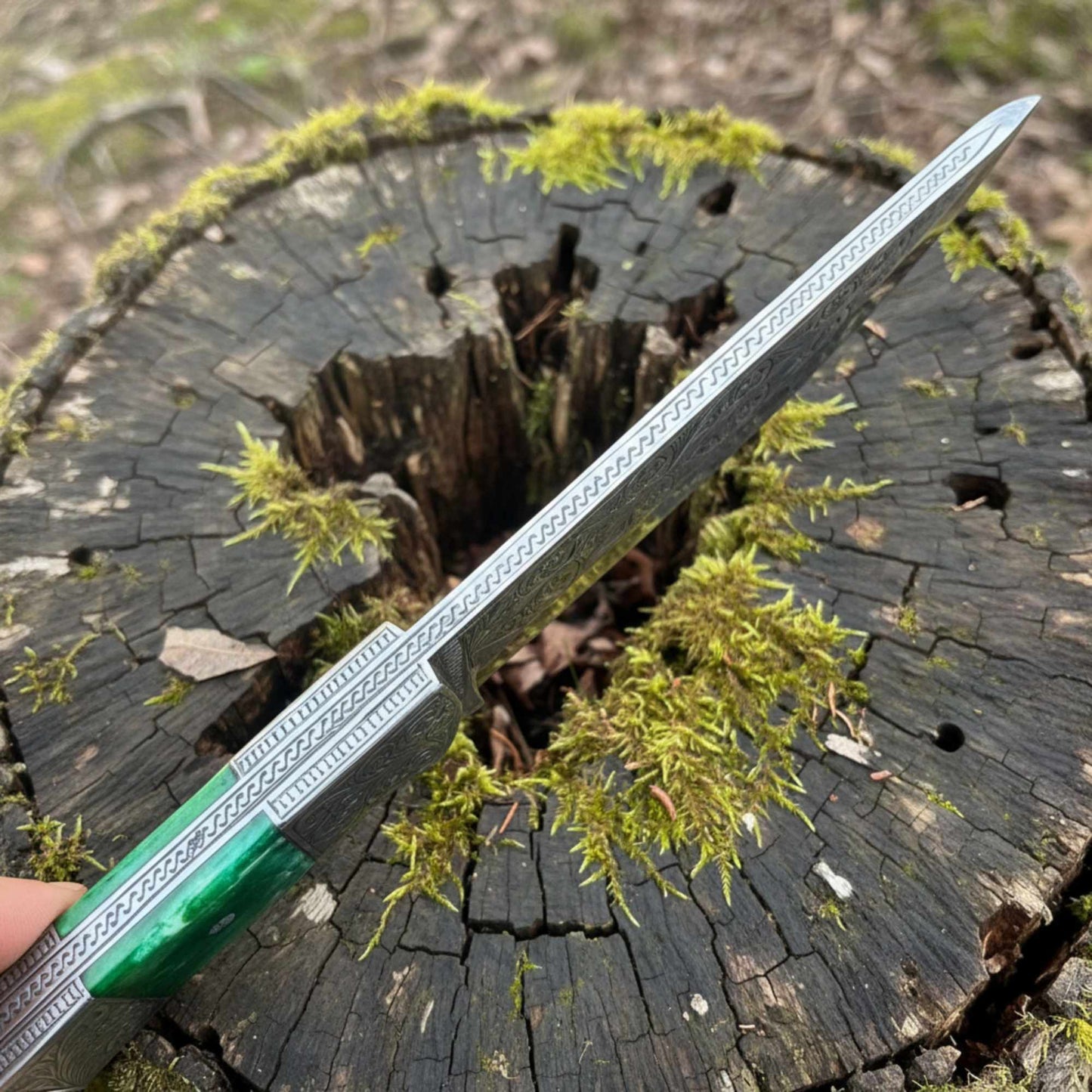 hand engraved hunting knife hand engraved spine in outdoor use