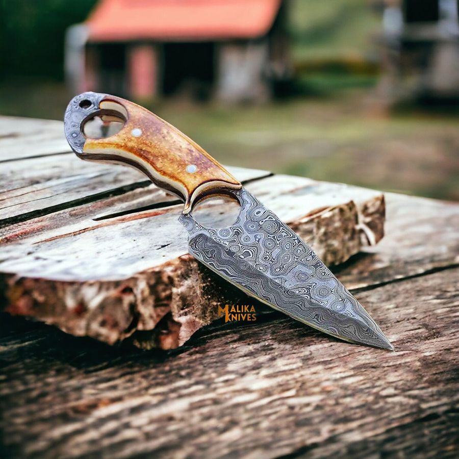 Custom skinning knives for hunters with wood and bone handles – ideal for field dressing, big game, and outdoor meat preparation