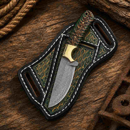 Damascus Buckaroo knife showing patterned blade and green pine cone handle with brass bolster