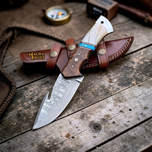 damascus gut hook hunting knife with rosewood marble handle and leather sheath