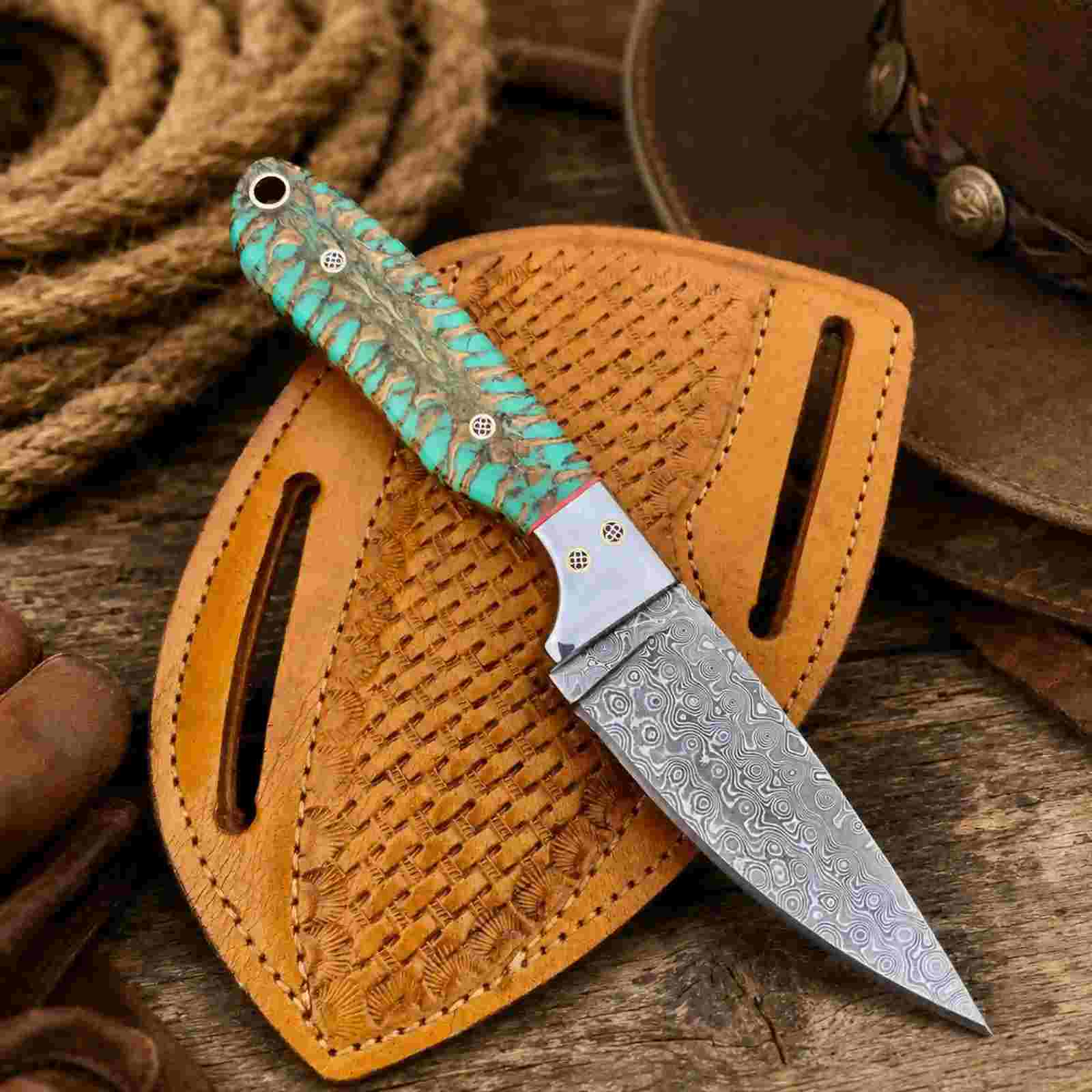 Damascus Buckaroo knife with pine cone handle and pancake leather sheath