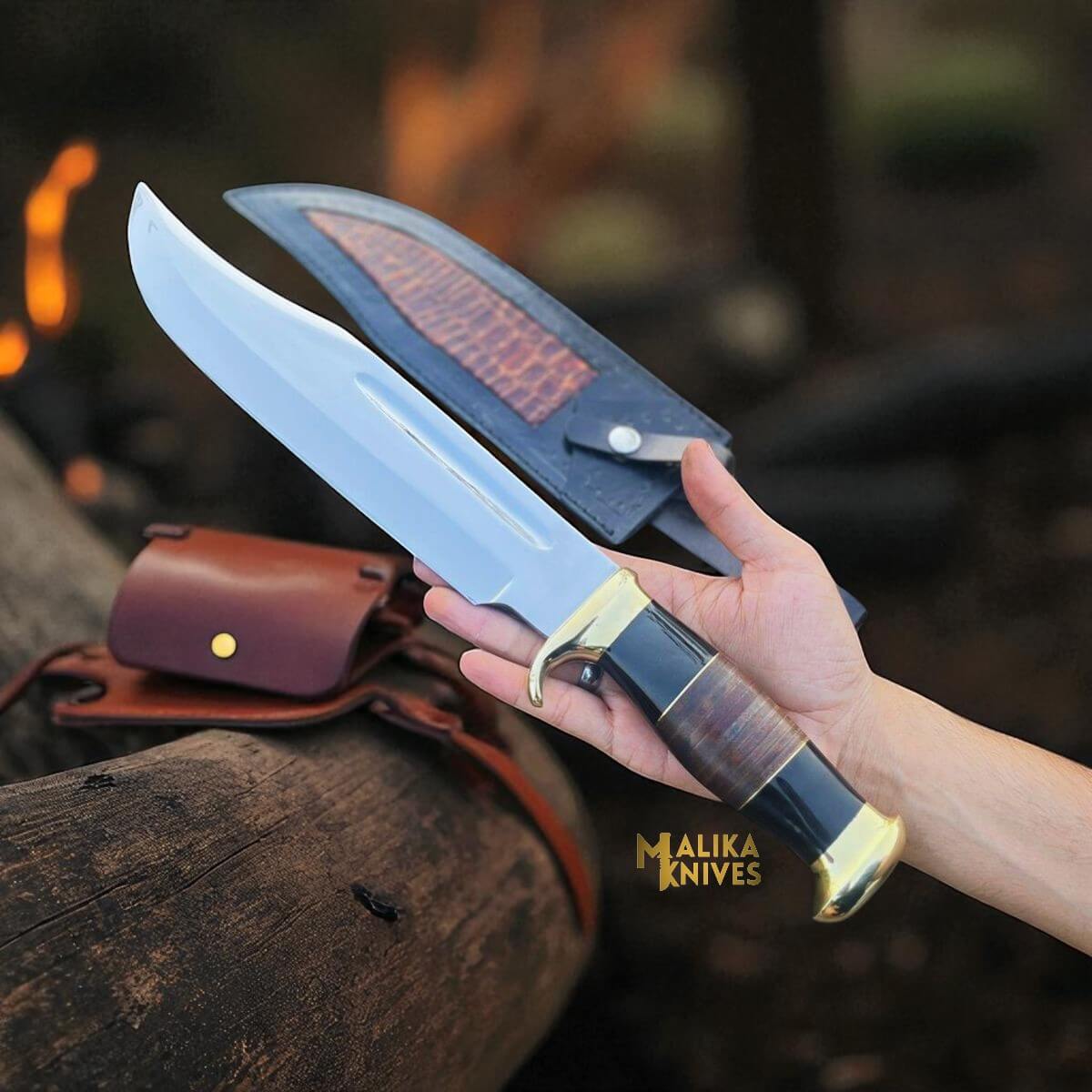 High-quality Crocodile Dundee Bowie knife with J2 stainless steel blade, brass guard, and custom leather sheath — perfect for hunting and survival