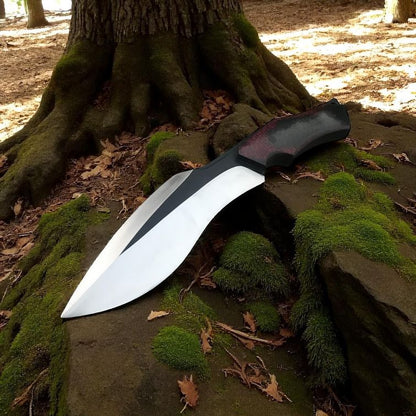 Bowie knife on a moss-covered stone with a tree in the background