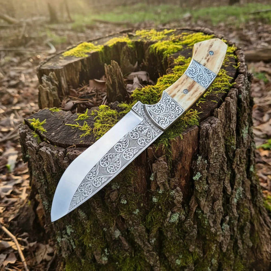 d2 hunting knife with antler horn handle and engraved blade with leather sheath