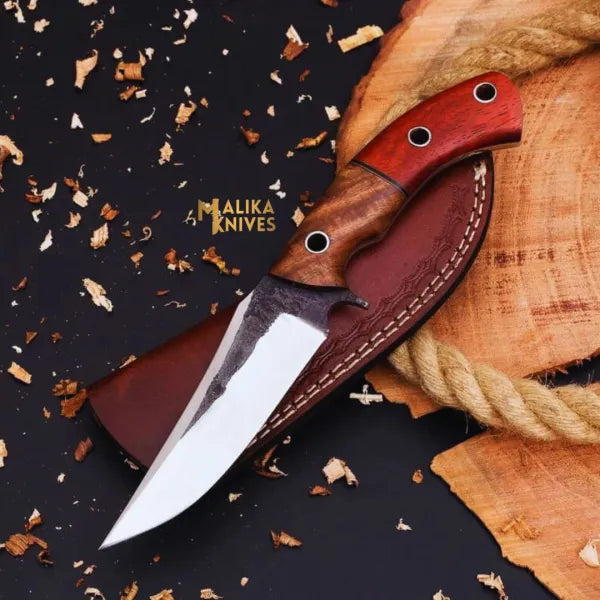d2 hunting knife with rose and pakka wood handle leather sheath outdoor setting