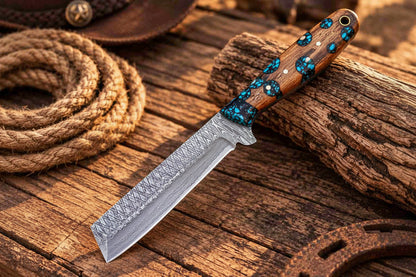 Damascus cowboy knife featuring blue resin wood handle and 8-inch design