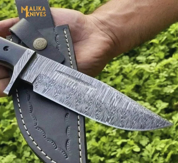 Fire pattern Damascus hunting knife with G10 handle outdoor setup