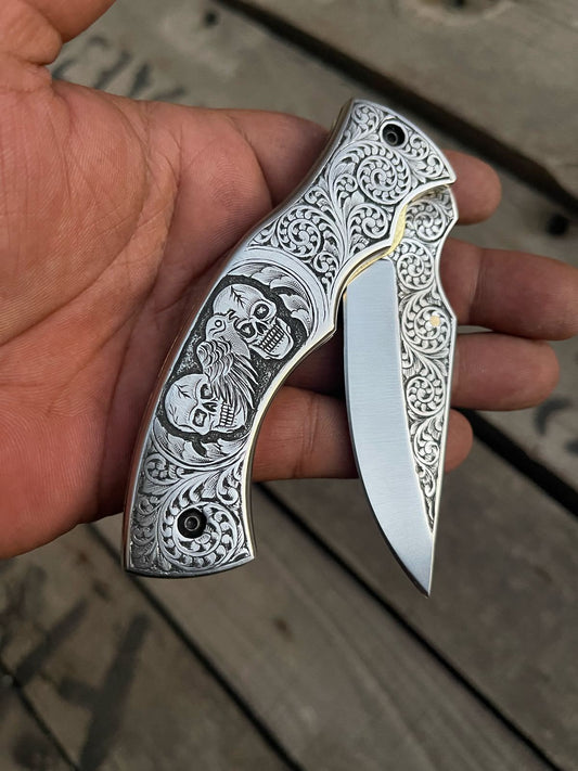  Hand engraved D2 steel folding knife with custom leather sheath