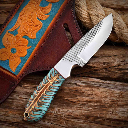 Closeup view of Forged rasp steel hunting knife pinecone handle.