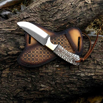Rasp steel skinner knife with textured spine and pine cone handle across a tooled leather sheath