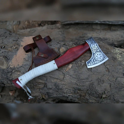 Hand-forged Kolovrat sunwheel Viking axe with red wood handle, white leather wrap and brown leather sheath