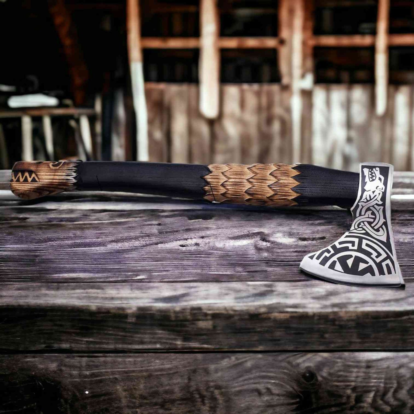 Norse wolf Viking bearded axe with 1075 carbon steel head and carved ash handle on weathered wood