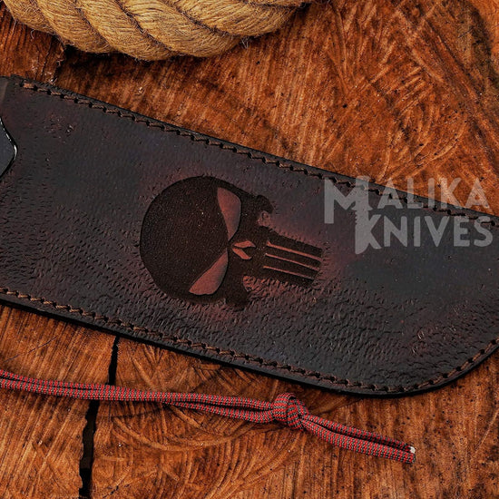  Video showcase of Punisher Bowie knife with Damascus steel fixed blade, G10 handle, and Punisher skull leather sheath for hunting, survival, and bushcraft.