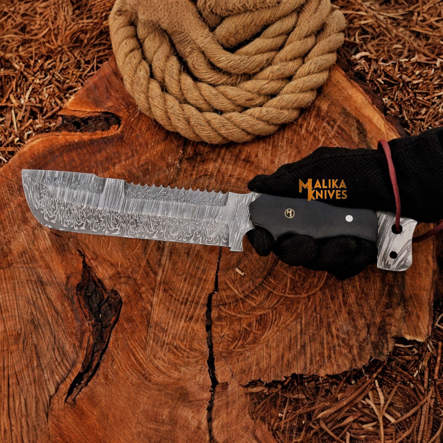 Punisher Bowie knife displayed with custom leather sheath featuring skull logo, full tang Damascus blade, and ergonomic G10 handle for tactical and hunting use.