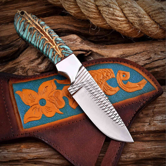 Full cowboy hunting knife with rasp blade and leather sheath