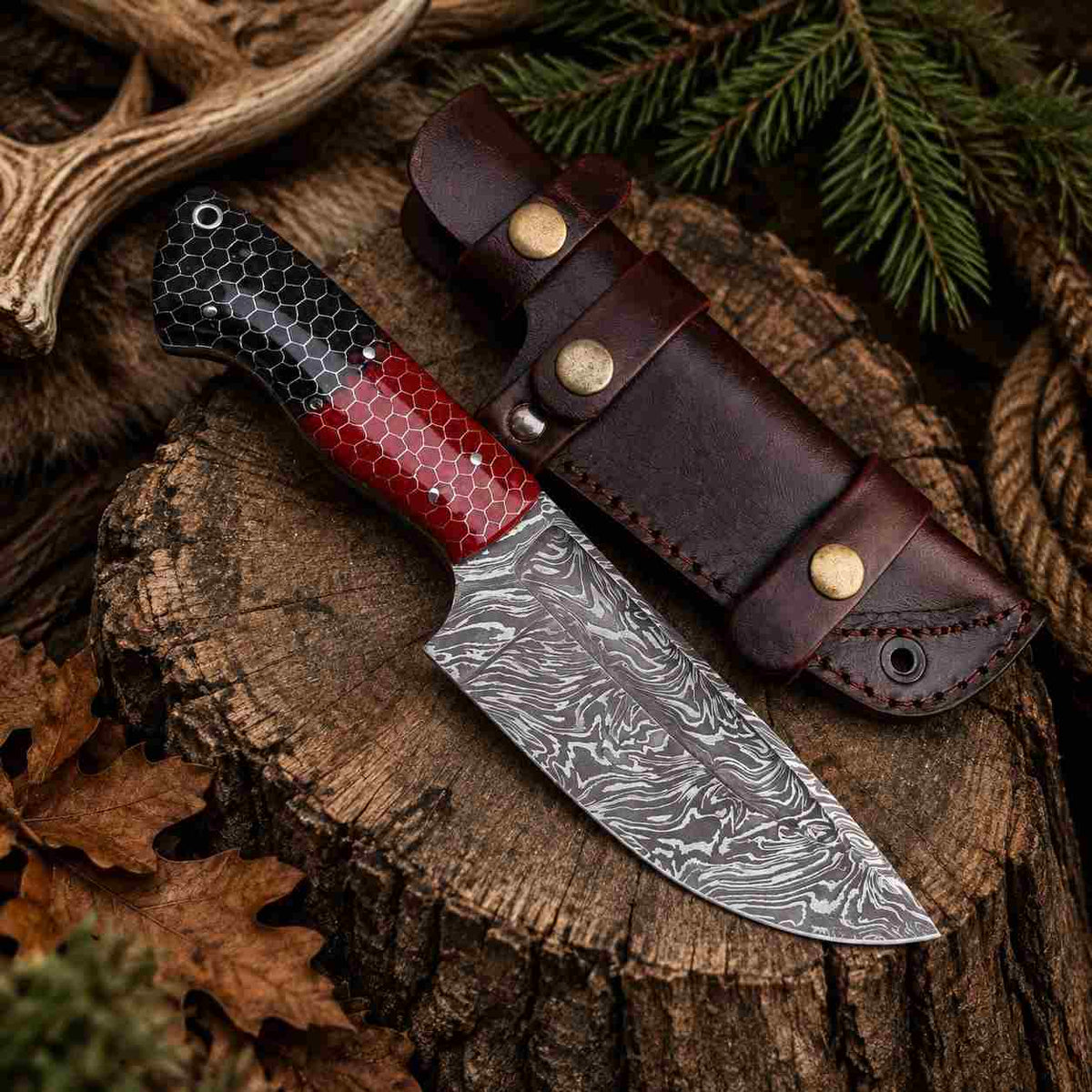 Damascus steel knife with unique red and black epoxy resin handle design