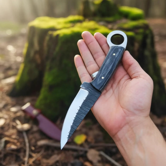 Hand holding ringtail hunting knife d2 steel blade pakka wood handle outdoor fixed blade knife