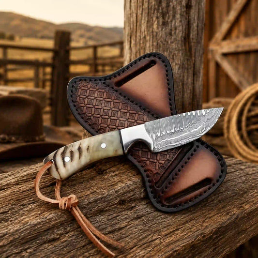 Damascus buckaroo knife with handmade leather sheath