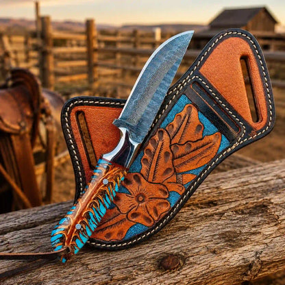 Buckaroo knife with leather sheath at sunset