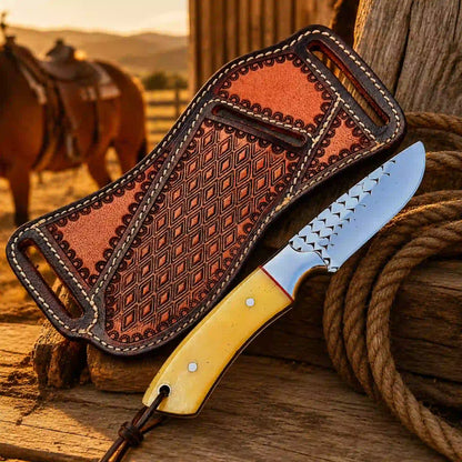 Buckaroo knife and handmade sheath at sunset