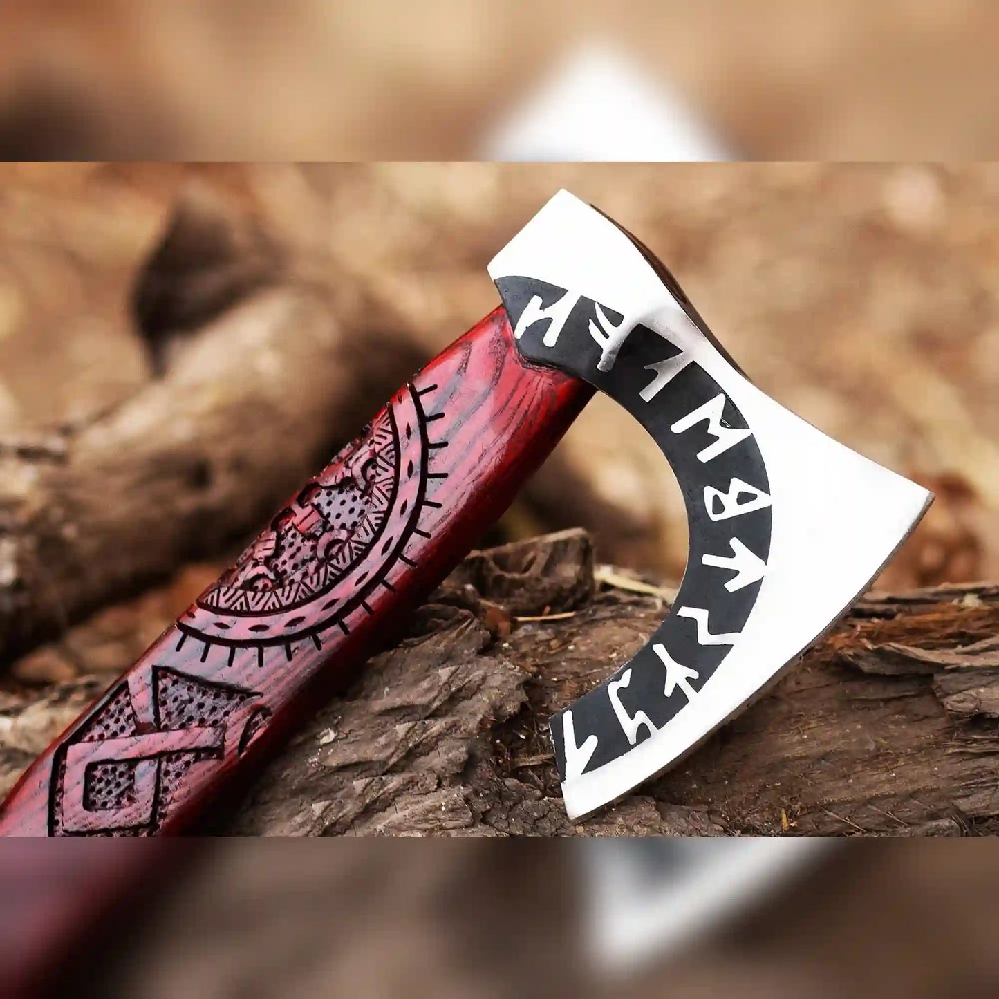 Close-up of Viking axe head with Norse runes and carved rune medallion on red ash handle